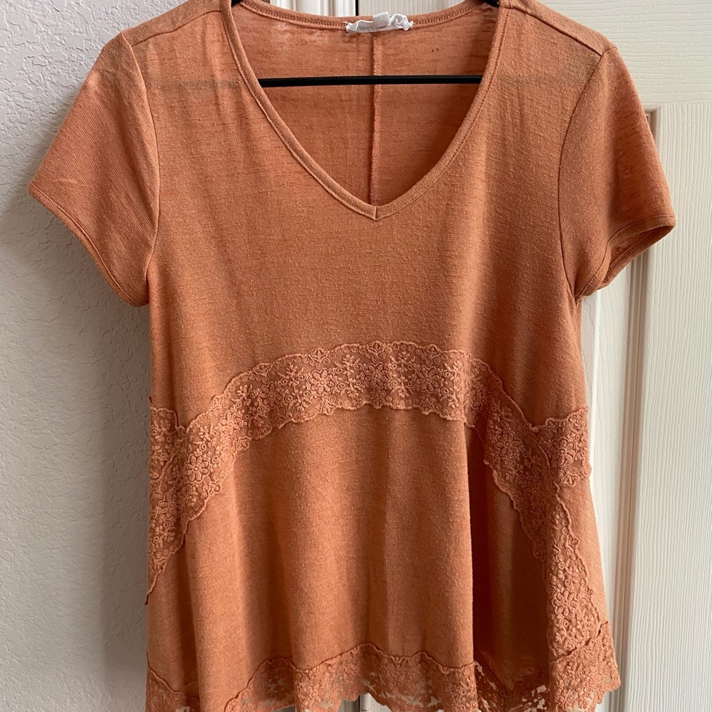 Cute women’s lace detail flirty top